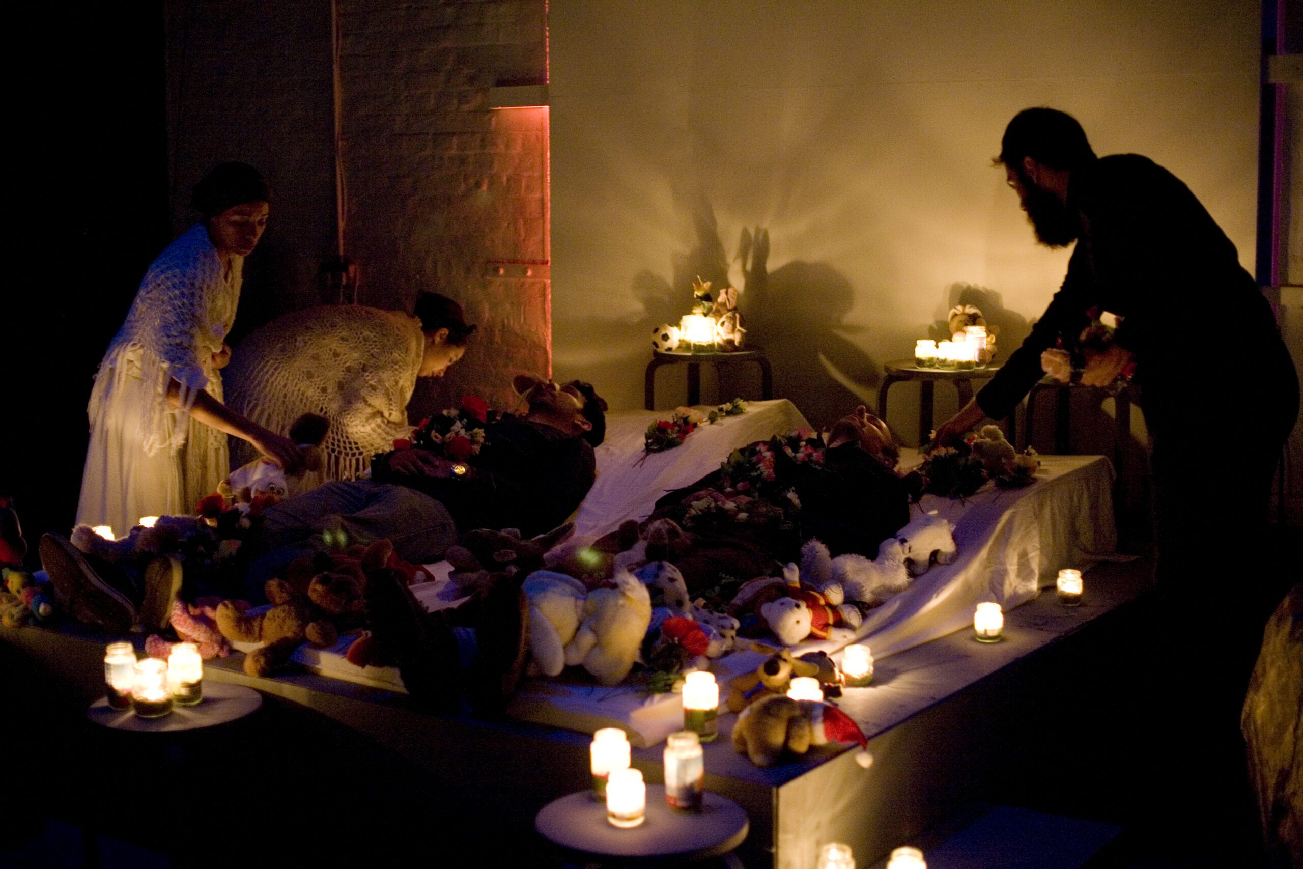 Guests helping to build burial shrines in 'Hotel Medea' by ZU-UK
