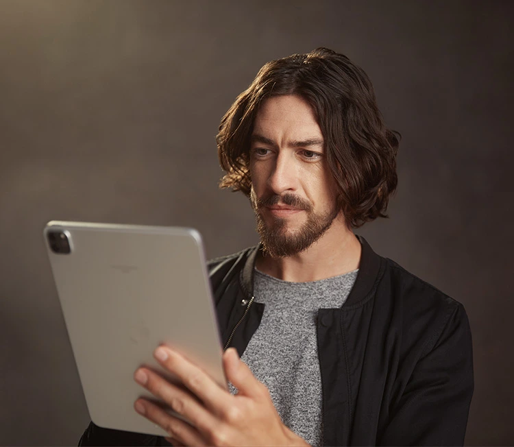 Man reading on a tablet