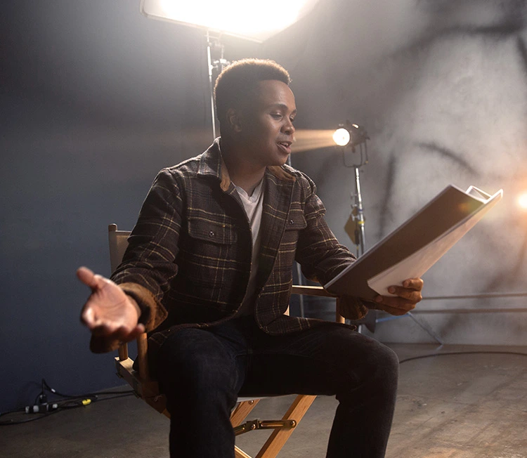Man reading a script